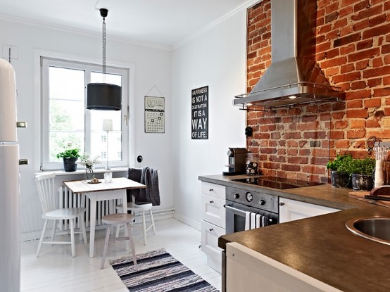 dettaglioi parete cucina stylish-kitchens-with-brick-walls-and-ceilings-43-554x415