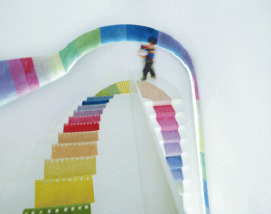 Colorful-Staircase-on-Pure-White-Painted-Wall-Seems-Like-a-Rainbow