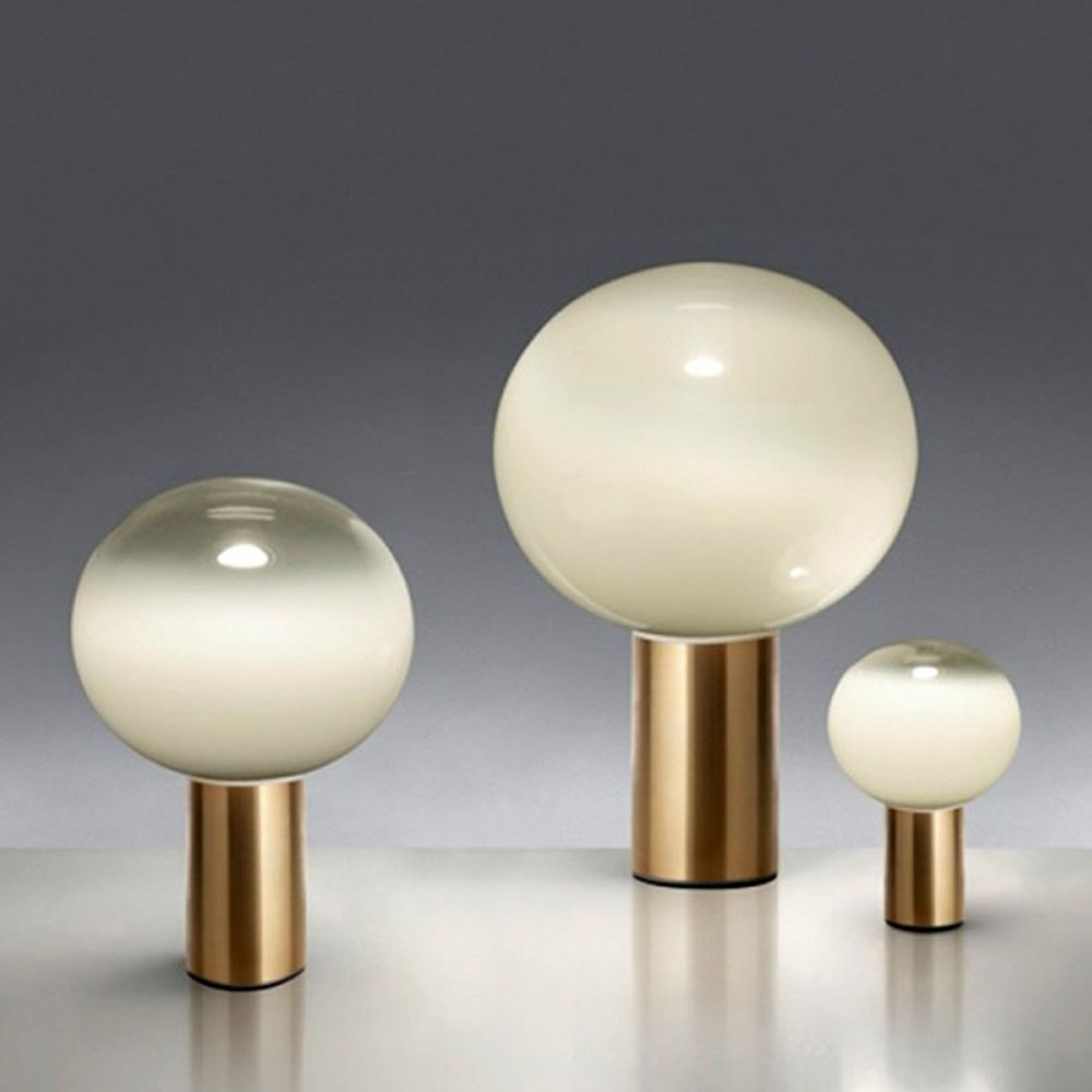 Come incorporare il marmo nel design d’interni - image lampada-2-laguna-tavolo-artemide on http://www.designedoo.it
